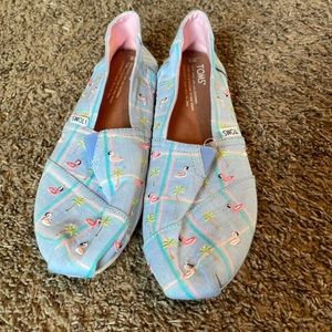 Tom’s flamingo and palm tree slip ons